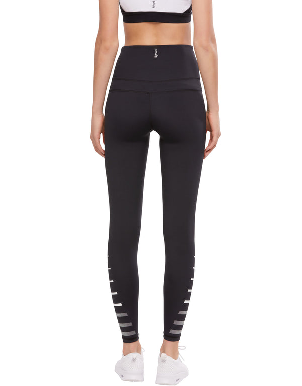 Black leggings with white stripes on a white background