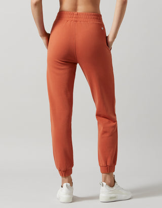 Lilybod Elliott Copper wash sweatpants on a white background