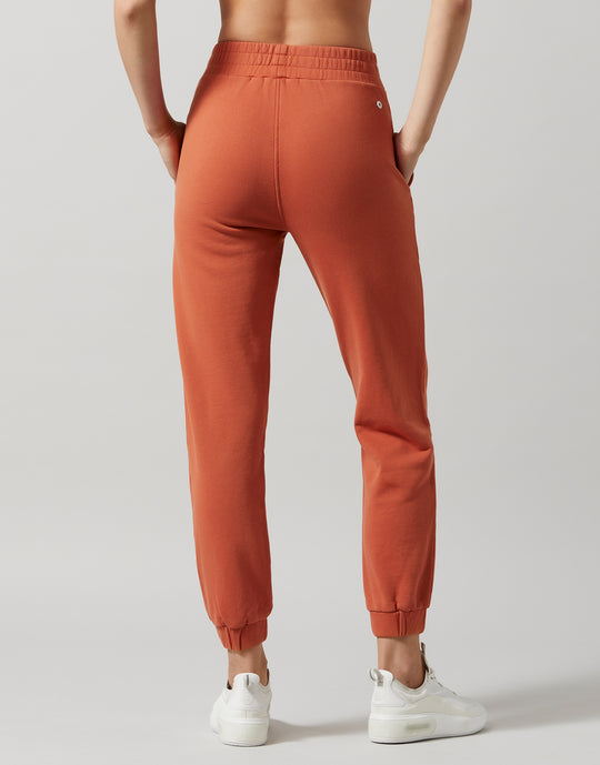 Lilybod Elliott Copper wash sweatpants on a white background