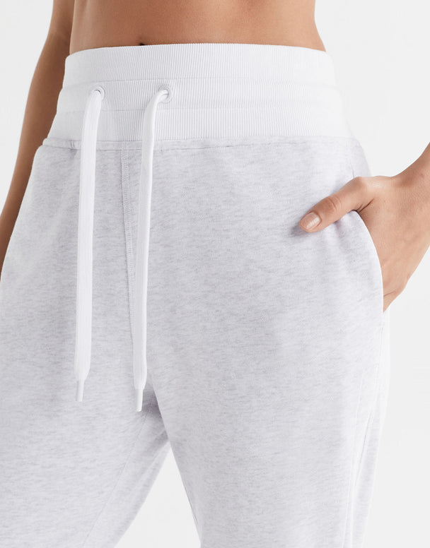 Gray sweatpants with white drawstring on a white background