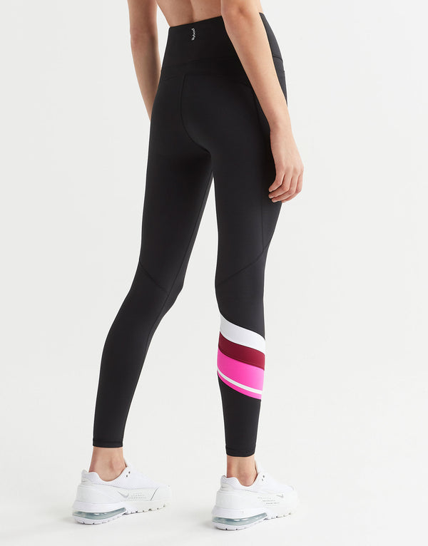 Black leggings with colorful stripes on a white background