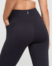 Black leggings with a brand logo on a white background