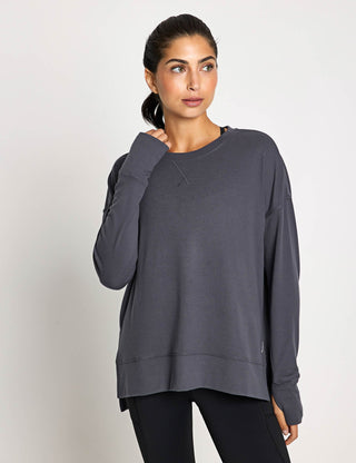 Woman wearing charcoal sweater top front image