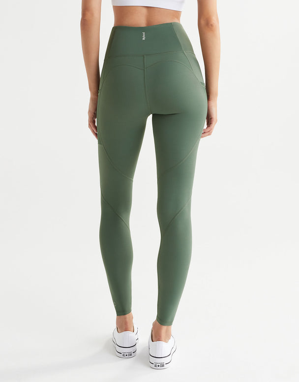 A model wearing army green leggings