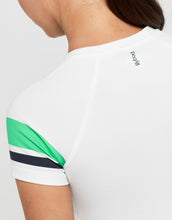 White t-shirt with green and black striped sleeves on a plain background